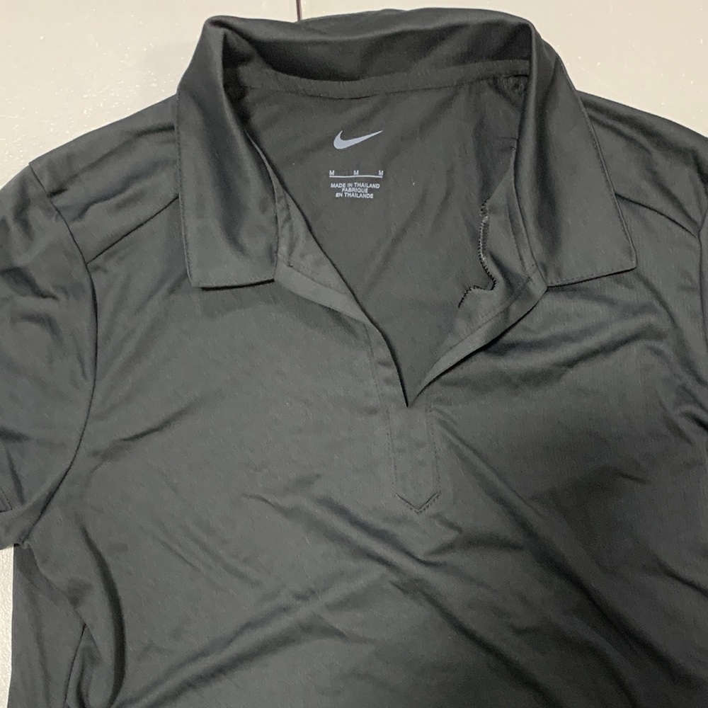 Nike womans  Dark Polo Shirt